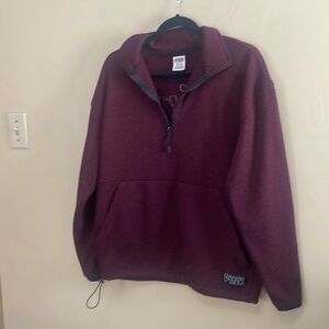 Pink pullover with a 1/4 zip size small